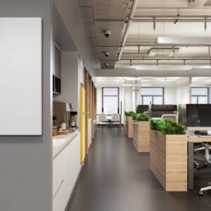 Interior Of An Empty Modern Open Plan Office With Empty Poster On The Wall